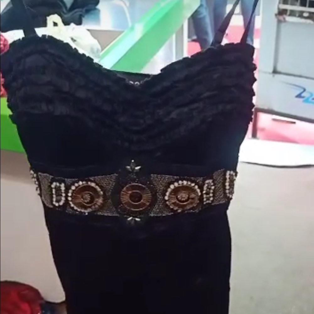 It is black mini one piece which is new